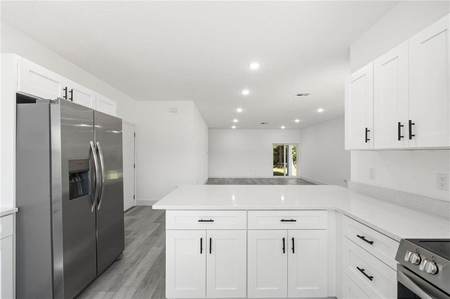 Furnished interior view inside a new home in , Clermont (Image 10).
