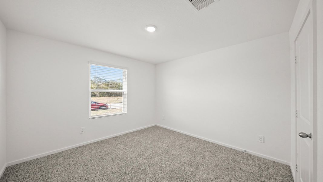Representative unfurnished interior of a home built from the Dawson by D.R. Horton in Lexington Heights, Willis (Image 19).