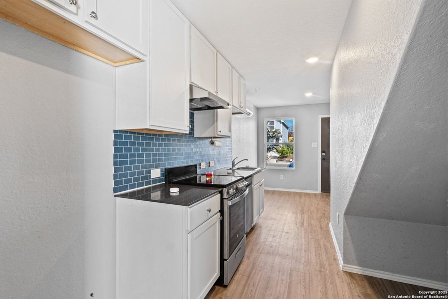 Furnished interior view inside a new home in Elm Trails, San Antonio (Image 4).