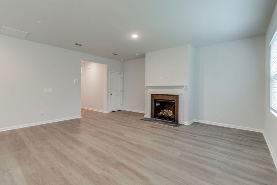 Experience the inviting warmth and conviviality of the gathering room in the Oriole at Grand Arbor.