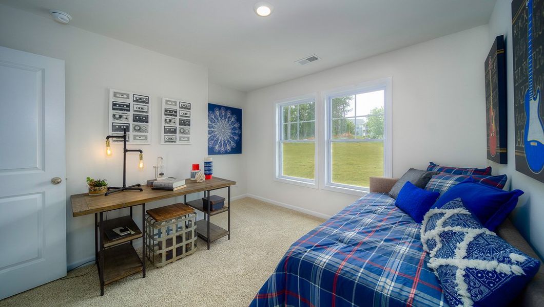 Furnished interior view inside a new home in Townes at Tap Root Farms, Fletcher (Image 27). Furnished interior view inside a new home in Townes at Tap Root Farms, Fletcher (Image 27).