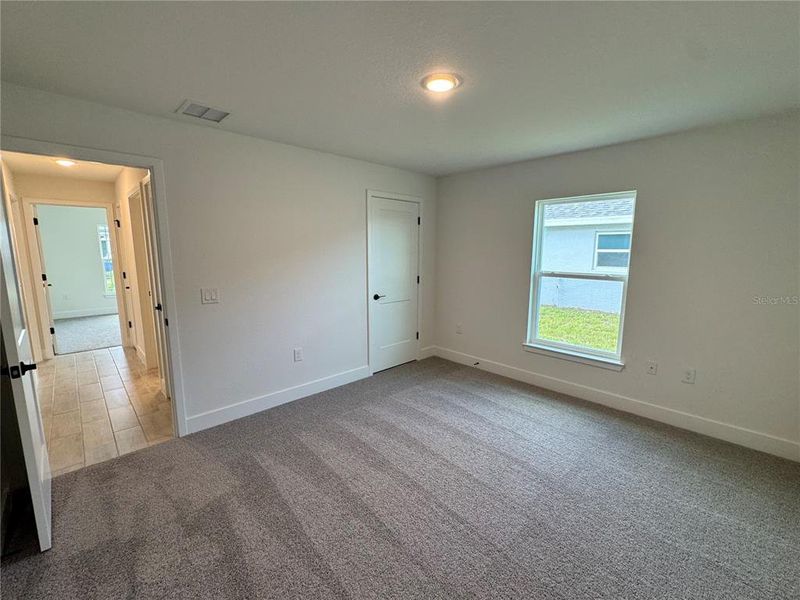 Spacious, unfurnished interior of a new home in Watercress Cove, North Port (Image 8). Spacious, unfurnished interior of a new home in Watercress Cove, North Port (Image 8).