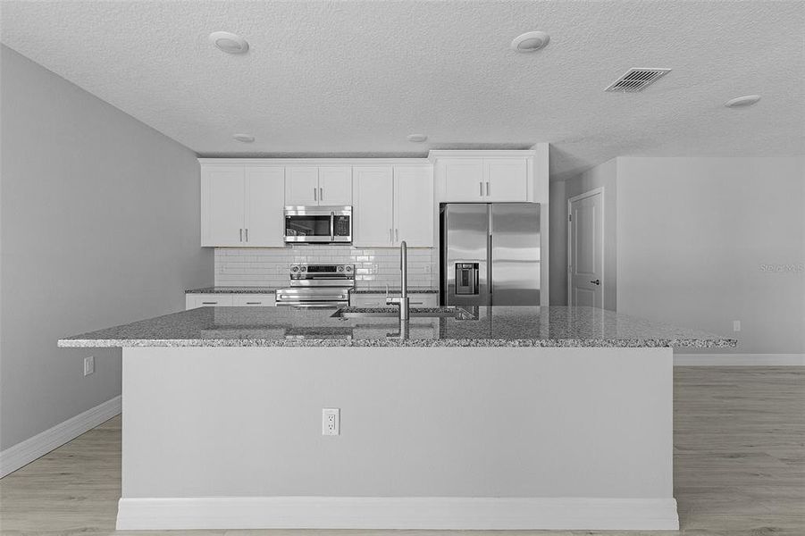 Furnished interior view inside a new home in , North Port (Image 4).