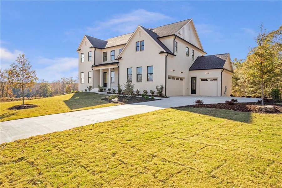 Front exterior of a new home in , Bogart, GA, highlighting curb appeal (Image 23).