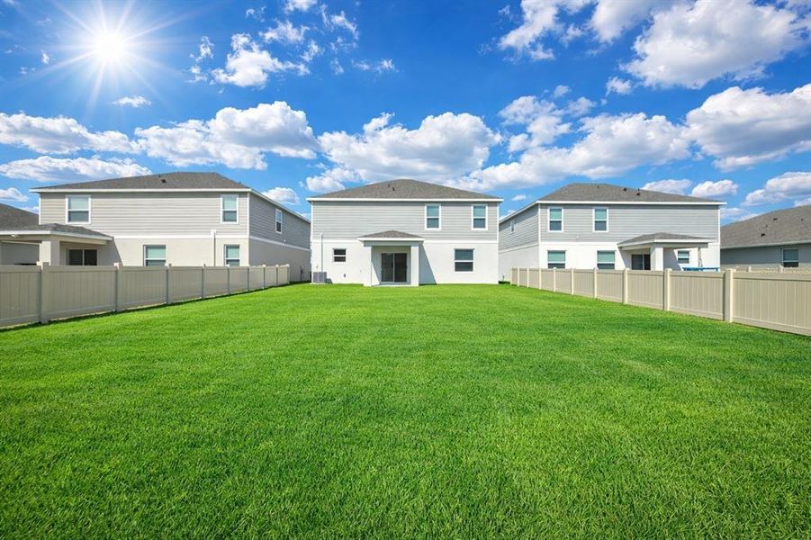 Exterior details and patio area of a home in Broadleaf, Parrish (Image 38).