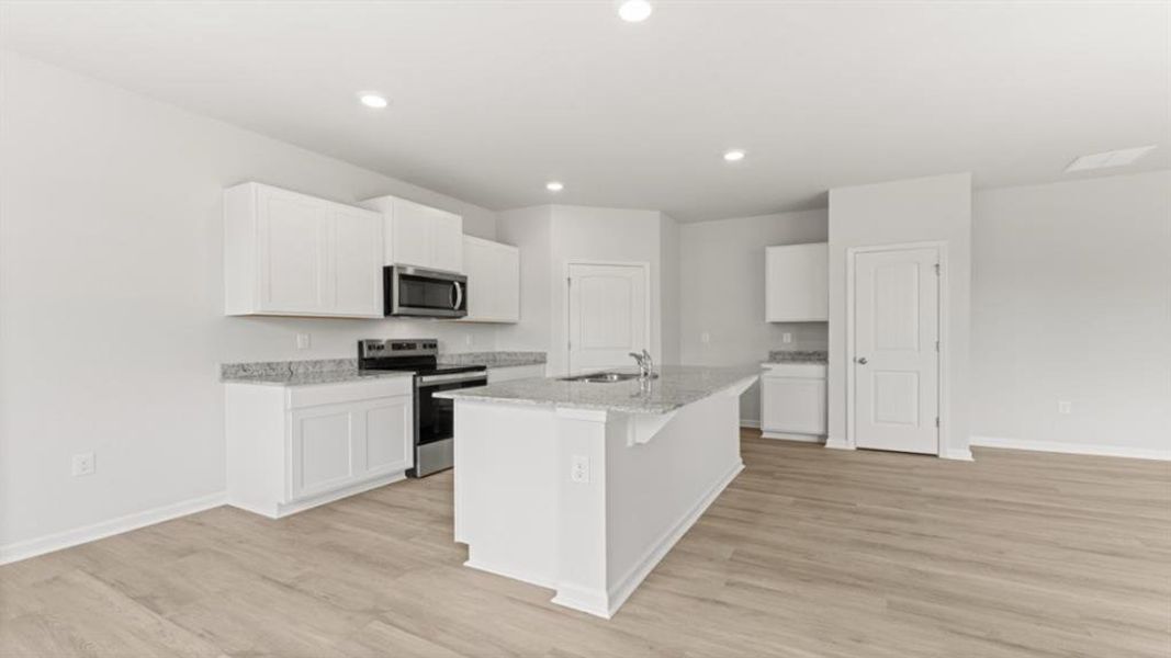 Furnished interior view inside a new home in Oaks at Cedar Grove, Fairburn (Image 5).
