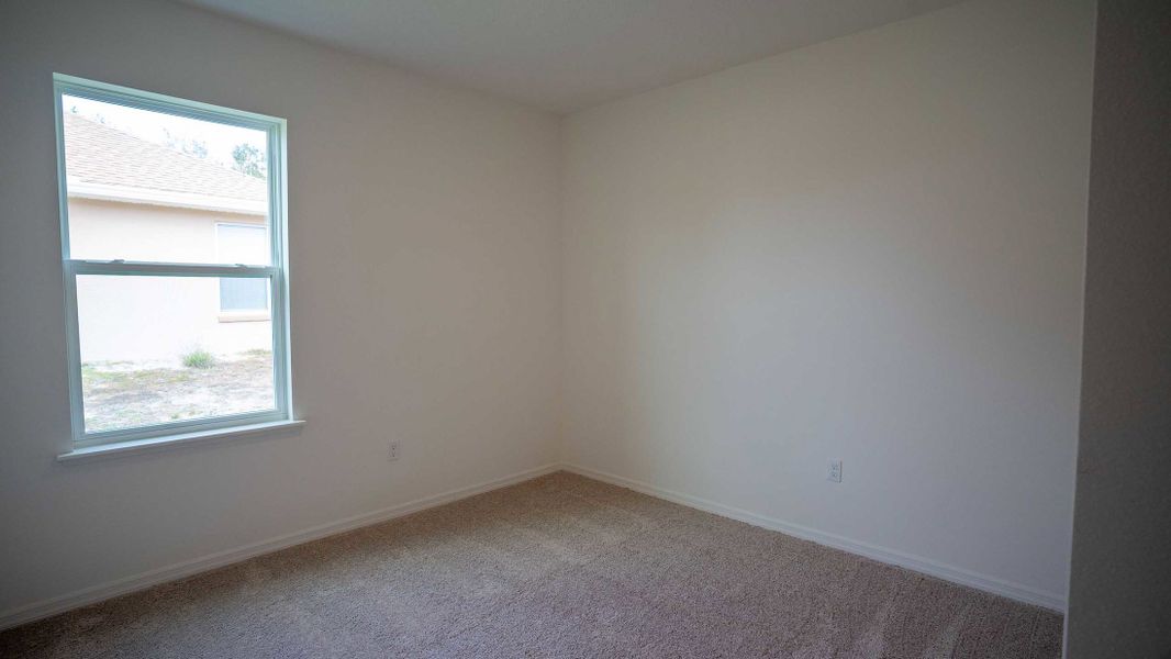 Representative unfurnished interior of a home built from the Magnolia by Maronda Homes in Vero Lake Estates, Sebastian (Image 17).
