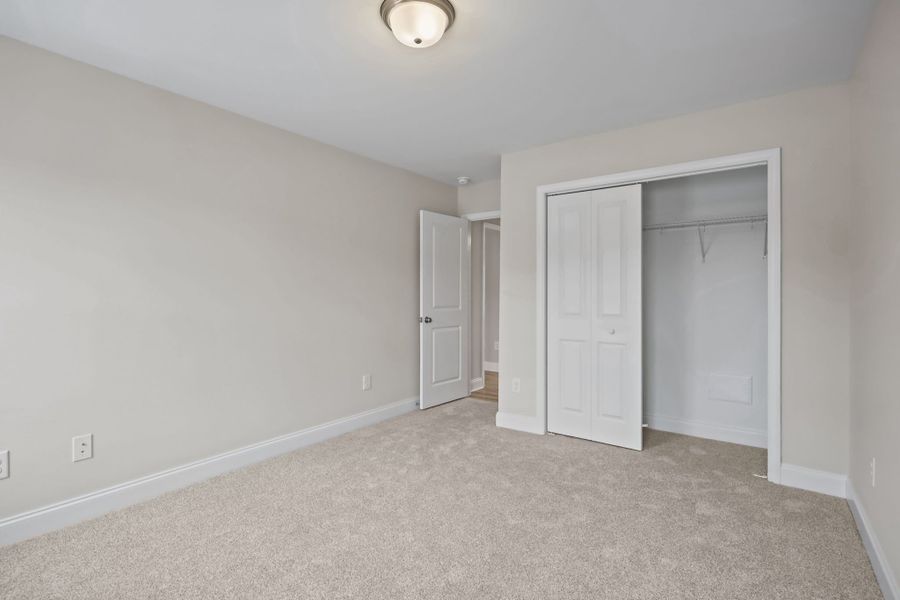 Representative unfurnished interior of a home built from the Hardy by Bill Clark Homes in Laurel Oaks, Greenville (Image 34).
