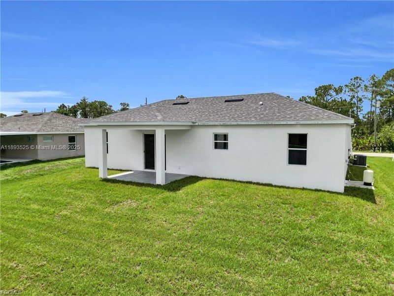 Exterior details and patio area of a home in , Lehigh Acres (Image 18). Exterior details and patio area of a home in , Lehigh Acres (Image 18).