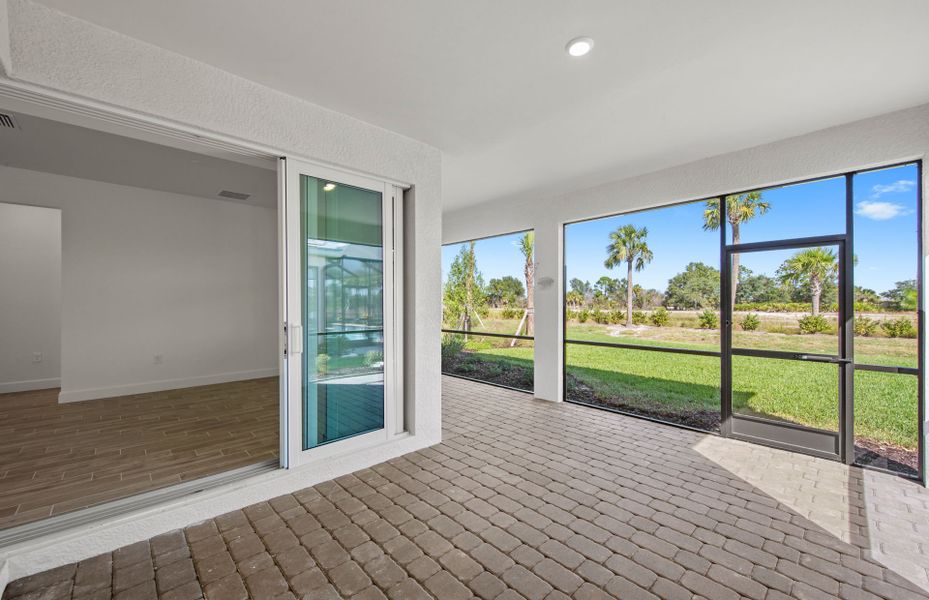 Exterior details and patio area of a home in TerraWalk at Babcock Ranch, Alva (Image 3).