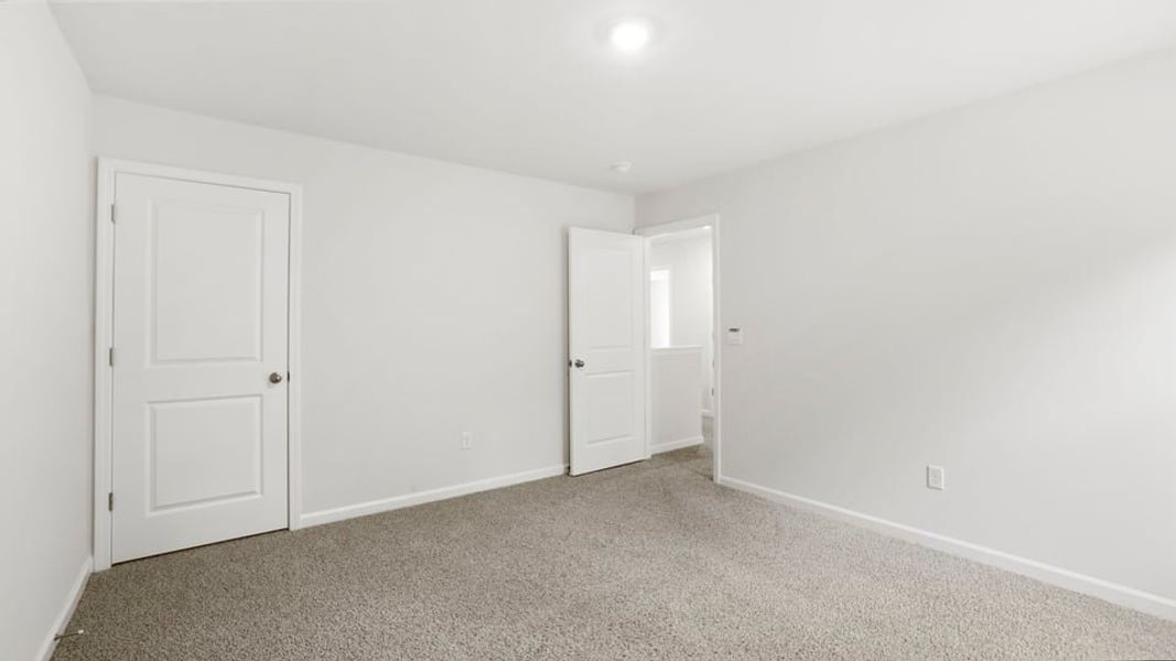 Spacious, unfurnished interior of a new home in Bentley Park, Greenwood (Image 28). Spacious, unfurnished interior of a new home in Bentley Park, Greenwood (Image 28).