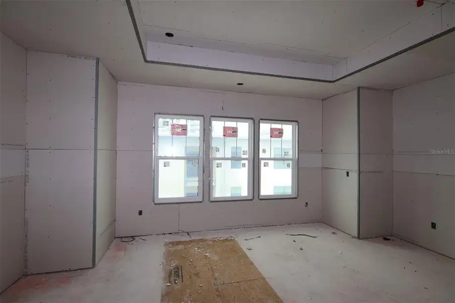 In-progress construction of a new home in Towns at Union, St. Petersburg, FL (Image 11).