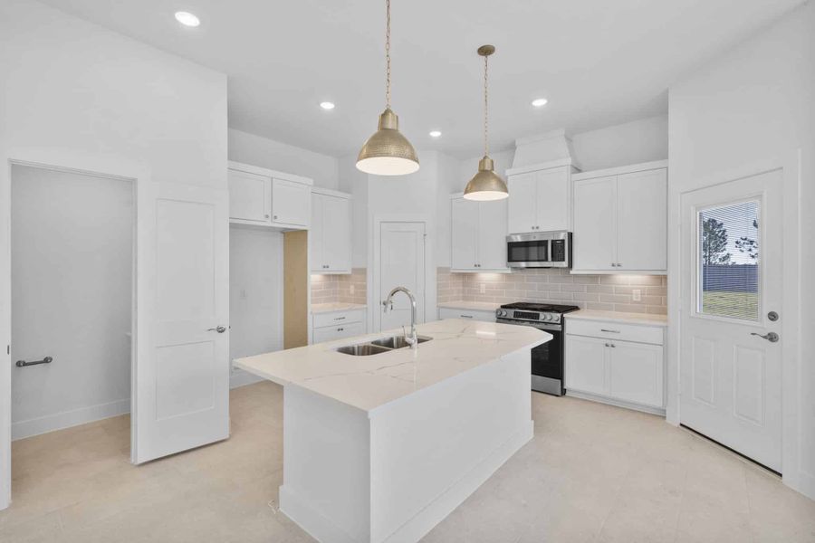 Furnished interior view inside a new home in Bridgeland, Cypress (Image 5).