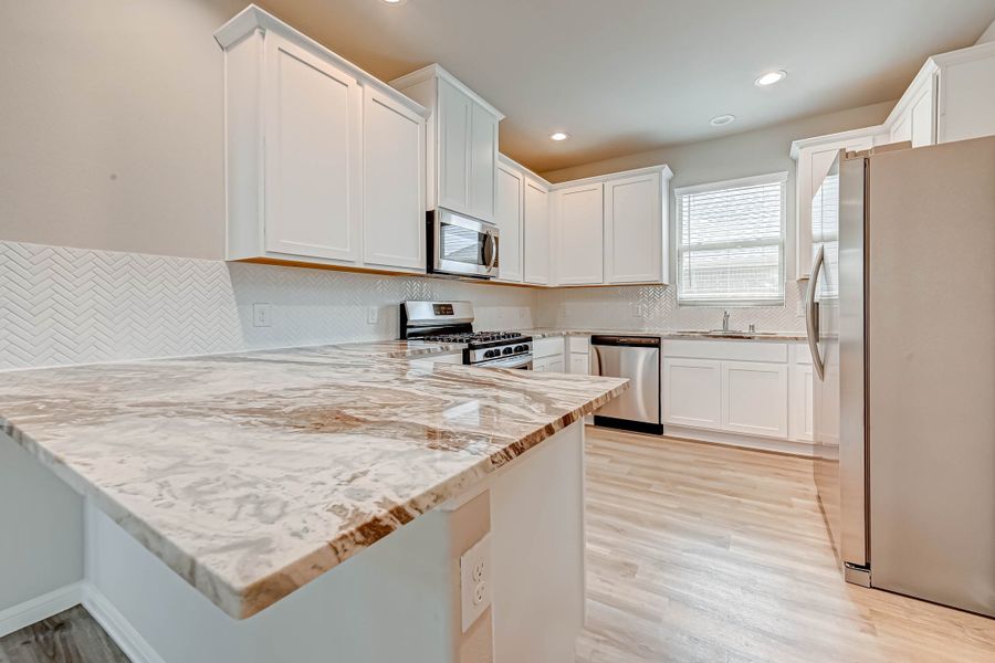 Representative furnished interior of a home built from the Floor Plan 2340 by Colina Homes in Grand Magnolia, Magnolia (Image 6). Representative furnished interior of a home built from the Floor Plan 2340 by Colina Homes in Grand Magnolia, Magnolia (Image 6).