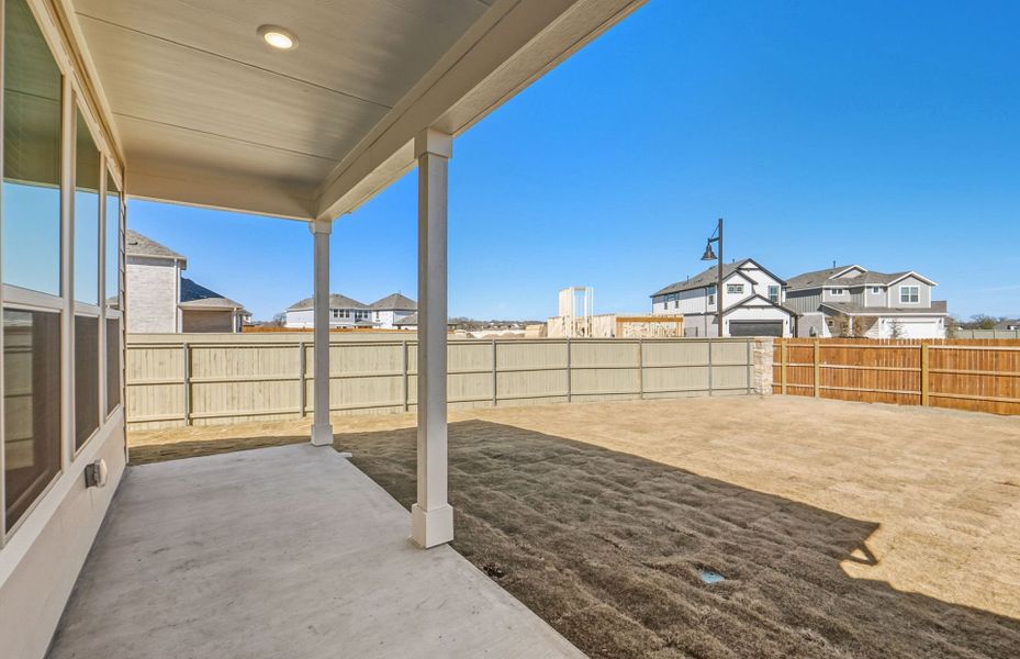 Exterior details and patio area of a home in Santa Rita Ranch, Liberty Hill (Image 31).