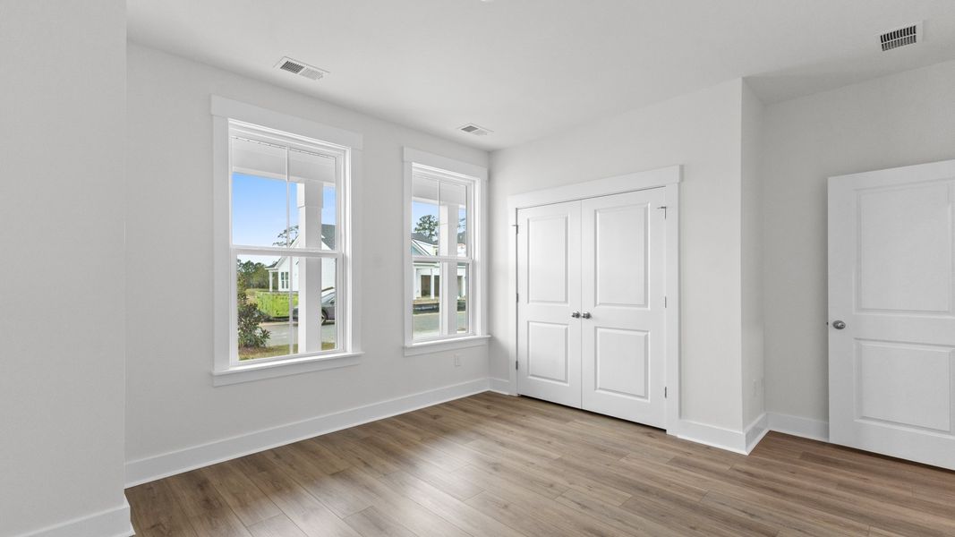 Furnished interior view inside a new home in Bluffs at Sun Colony, Longs (Image 17).
