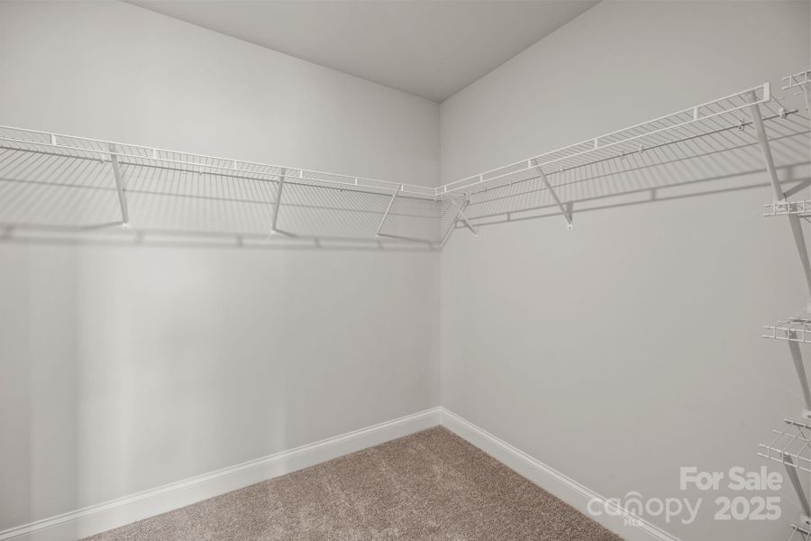 Primary Walk in Closet Primary Walk in Closet