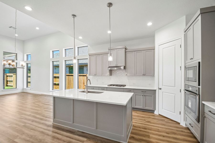 Furnished interior view inside a new home in 6 Creeks, Kyle (Image 5).