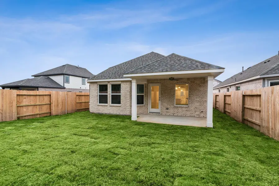 Exterior details and patio area of a home in Sorella, Tomball (Image 2). Exterior details and patio area of a home in Sorella, Tomball (Image 2).