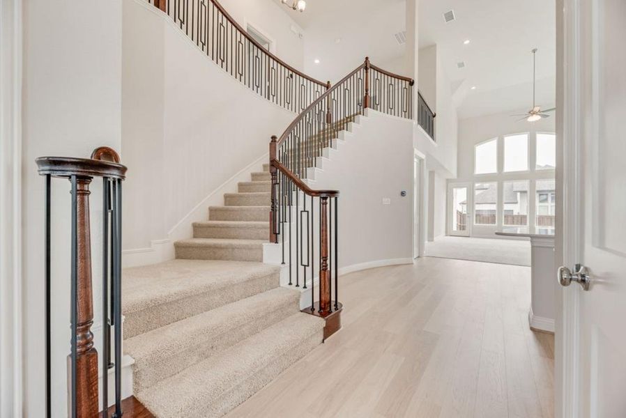Representative unfurnished interior of a home built from the Royal Martinique by Grand Homes in Prairie Ridge, Venus (Image 12). Representative unfurnished interior of a home built from the Royal Martinique by Grand Homes in Prairie Ridge, Venus (Image 12).