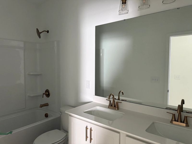 Bath 2 featuring the AW Collection® Serene - Earth-toned surfaces bring warmth and calm. Bath 2 featuring the AW Collection® Serene - Earth-toned surfaces bring warmth and calm.