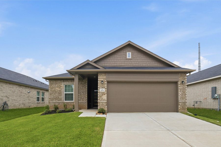 Front exterior of a new home in Steed Landing, Texas City, TX, highlighting curb appeal (Image 15). Front exterior of a new home in Steed Landing, Texas City, TX, highlighting curb appeal (Image 15).