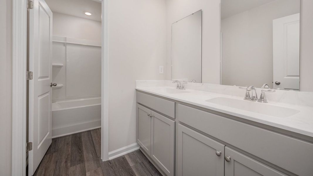 Representative furnished interior of a home built from the WREN by D.R. Horton in Sidbury Station, Castle Hayne (Image 10).