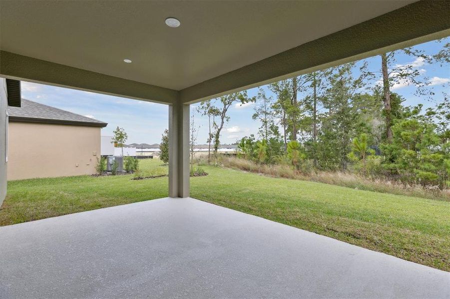Exterior details and patio area of a home in Caldera, Spring Hill (Image 3).