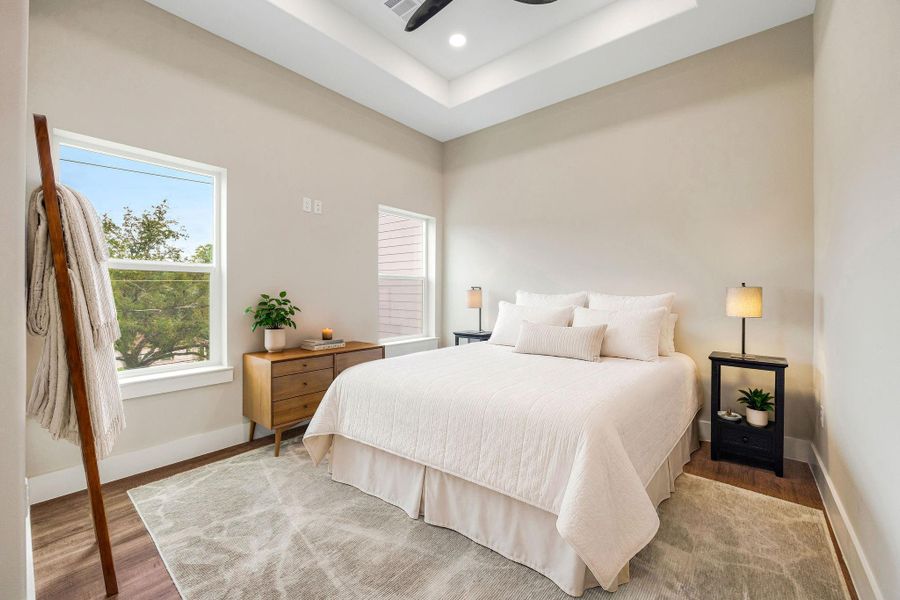 Peaceful primary retreat with generous proportions and views overlooking the neighborhood. Peaceful primary retreat with generous proportions and views overlooking the neighborhood.