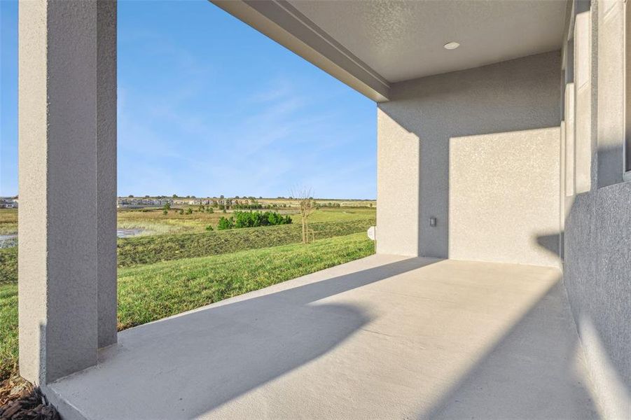 Exterior details and patio area of a home in Wellness Ridge, Clermont (Image 4).