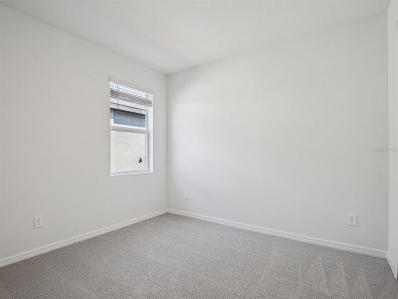 Spacious, unfurnished interior of a new home in Coasterra - Reserve Series, Palmetto (Image 19).