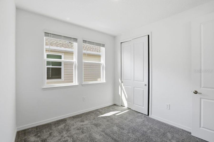 Spacious, unfurnished interior of a new home in Harvest at Ovation, Winter Garden (Image 18).