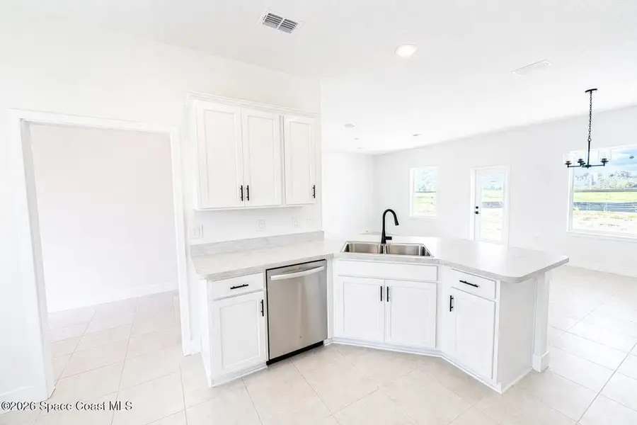 Furnished interior view inside a new home in St. John's Preserve, Palm Bay (Image 4).