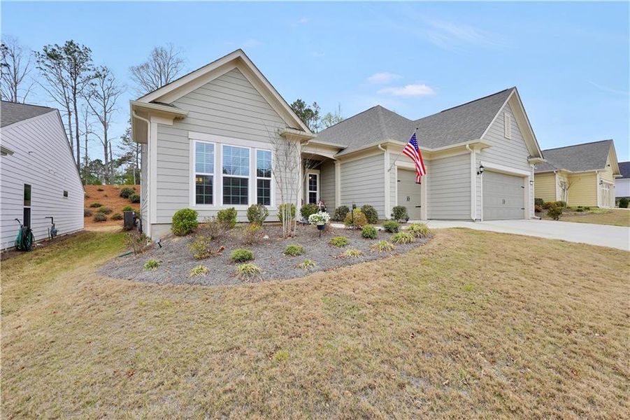 Front exterior of a new home in , Griffin, GA, highlighting curb appeal (Image 24).