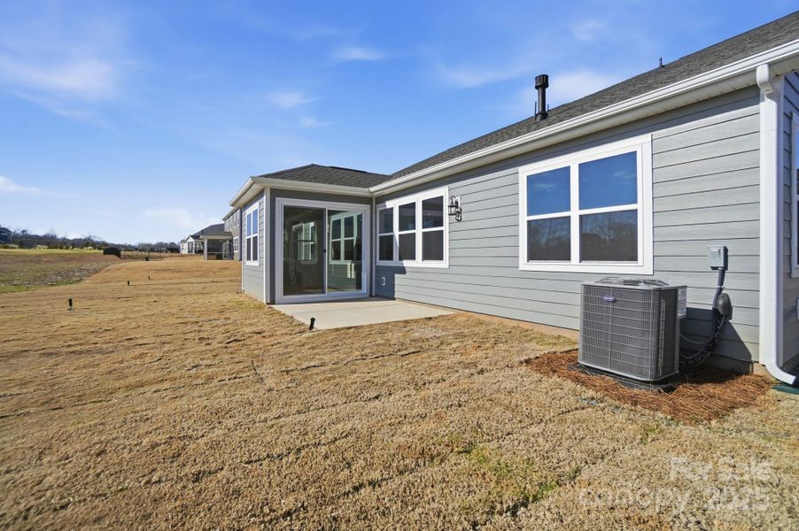 Exterior details and patio area of a home in Blair Place, Monroe (Image 29).