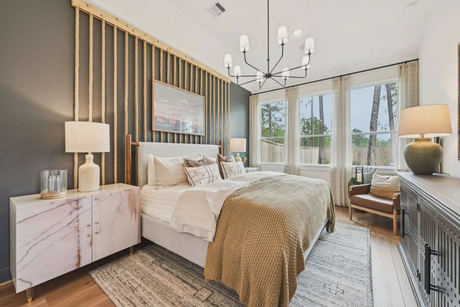 Representative furnished interior of a home built from the Tanlay by Chesmar Homes in The Woodland Hills Chateau, Willis (Image 7).