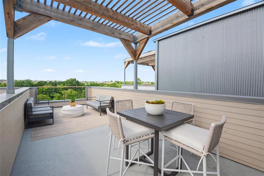 Spacious roof-top terrace has a spectacular view and is the perfect spot for your morning coffee or evenings entertaining.