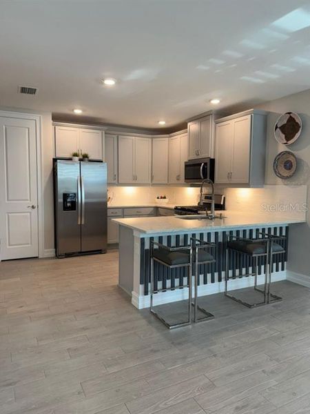 Furnished interior view inside a new home in , Punta Gorda (Image 3).