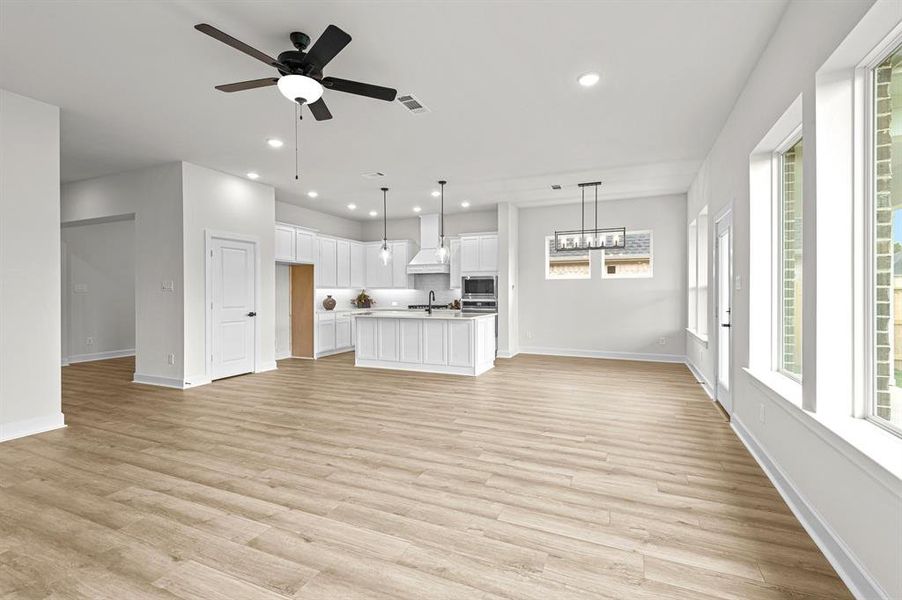 EXAMPLE PHOTO: View from family room towards kitchen and dining