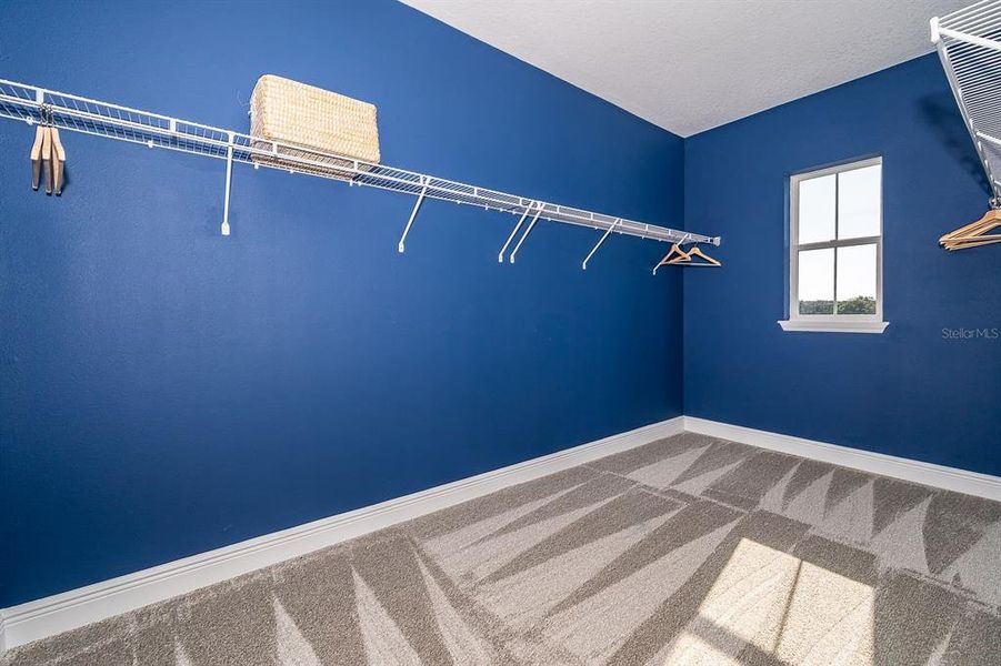 Spacious, unfurnished interior of a new home in Serenade at Ovation, Winter Garden (Image 19).