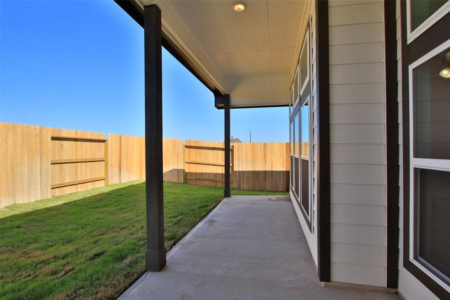 Exterior details and patio area of a home in Oakwood Estates, Waller (Image 19).