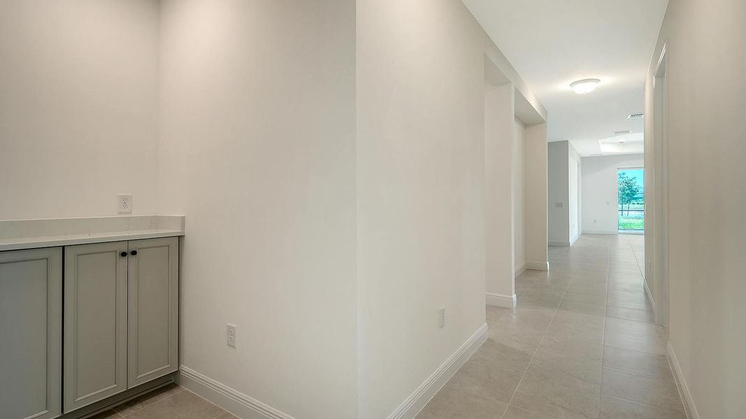 Spacious, unfurnished interior of a new home in Palmera Real Estate and Homes for Sale in Venice, FL - Neal Communities, Venice (Image 17). Spacious, unfurnished interior of a new home in Palmera Real Estate and Homes for Sale in Venice, FL - Neal Communities, Venice (Image 17).