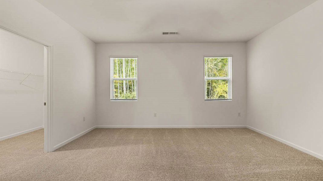 Representative unfurnished interior of a home built from the Dennis by D.R. Horton in Glenmaye, Hampton (Image 17).