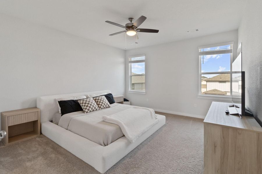 Spacious Master Bedroom featuring a ceiling fan