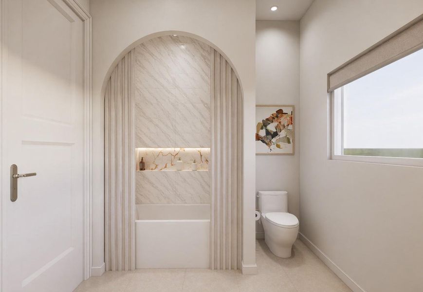 Thoughtfully designed guest bath with tub, arched detail, and refined modern finishes. Thoughtfully designed guest bath with tub, arched detail, and refined modern finishes.