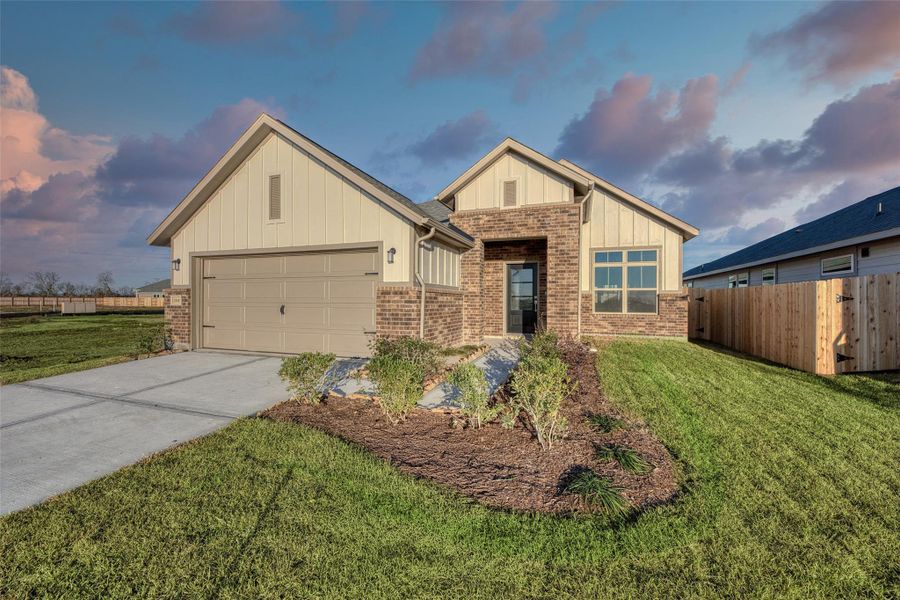 Front exterior of a new home in Aldeana - Paintbrush Collection, Bonney, TX, highlighting curb appeal (Image 1). Front exterior of a new home in Aldeana - Paintbrush Collection, Bonney, TX, highlighting curb appeal (Image 1).