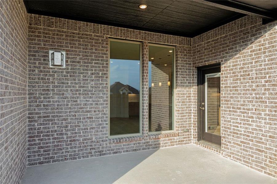 Exterior details and patio area of a home in Country Lakes Classic 50, Denton (Image 4). Exterior details and patio area of a home in Country Lakes Classic 50, Denton (Image 4).