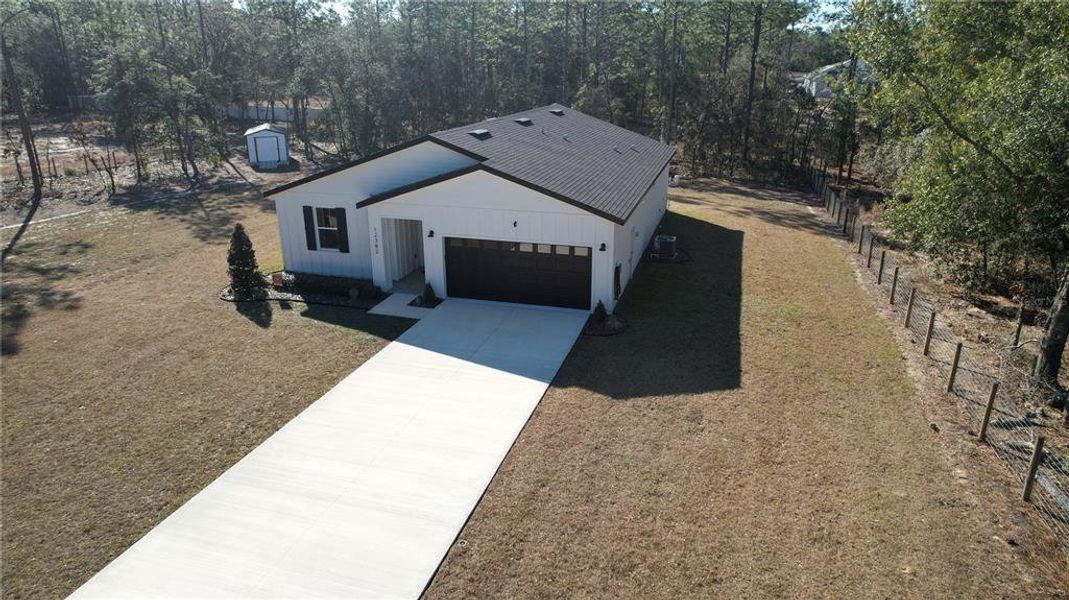 Front exterior of a new home in , Ocala, FL, highlighting curb appeal (Image 20).