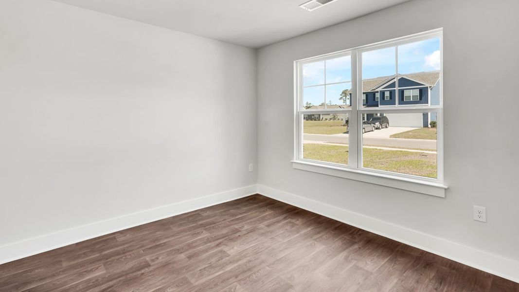 Spacious, unfurnished interior of a new home in Sidbury Station, Castle Hayne (Image 24).