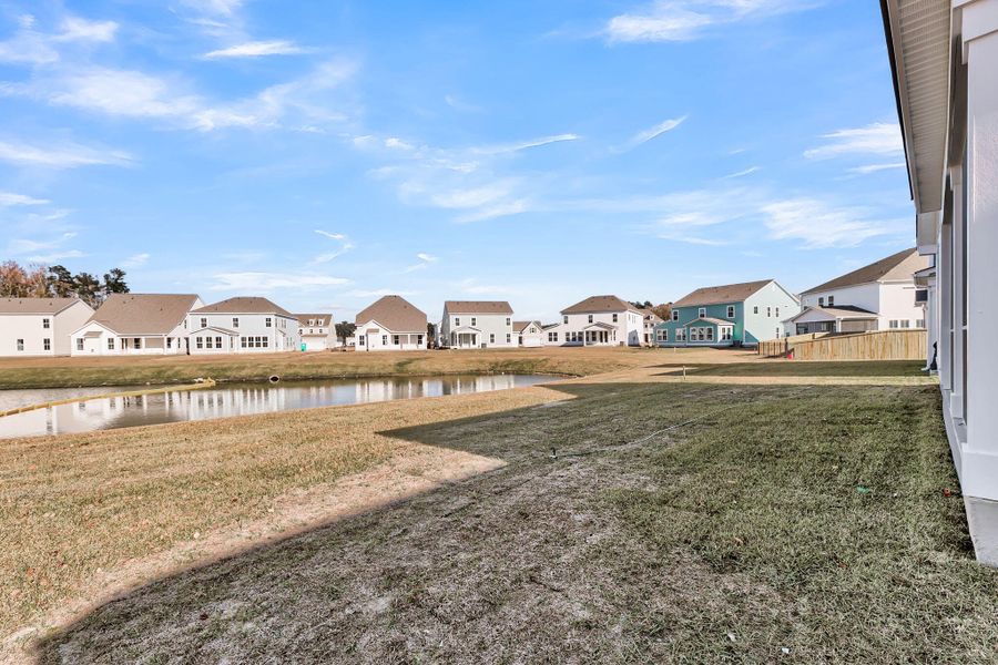 Exterior details and patio area of a home in Tidewater at Lakes of Cane Bay, Summerville (Image 3).